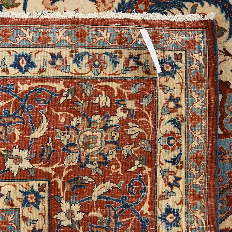 A old Esfahan carpet, around 299 x 210 cm.