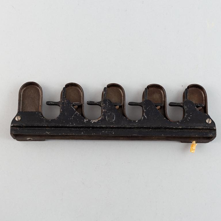 A 19th century iron umbrella and walkingstick holder.