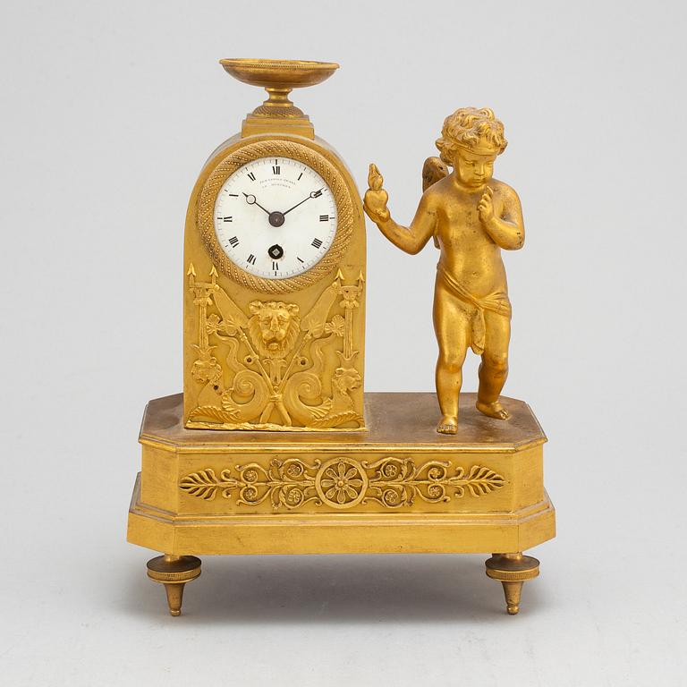 A German Empire mantel clock, early 19th century.