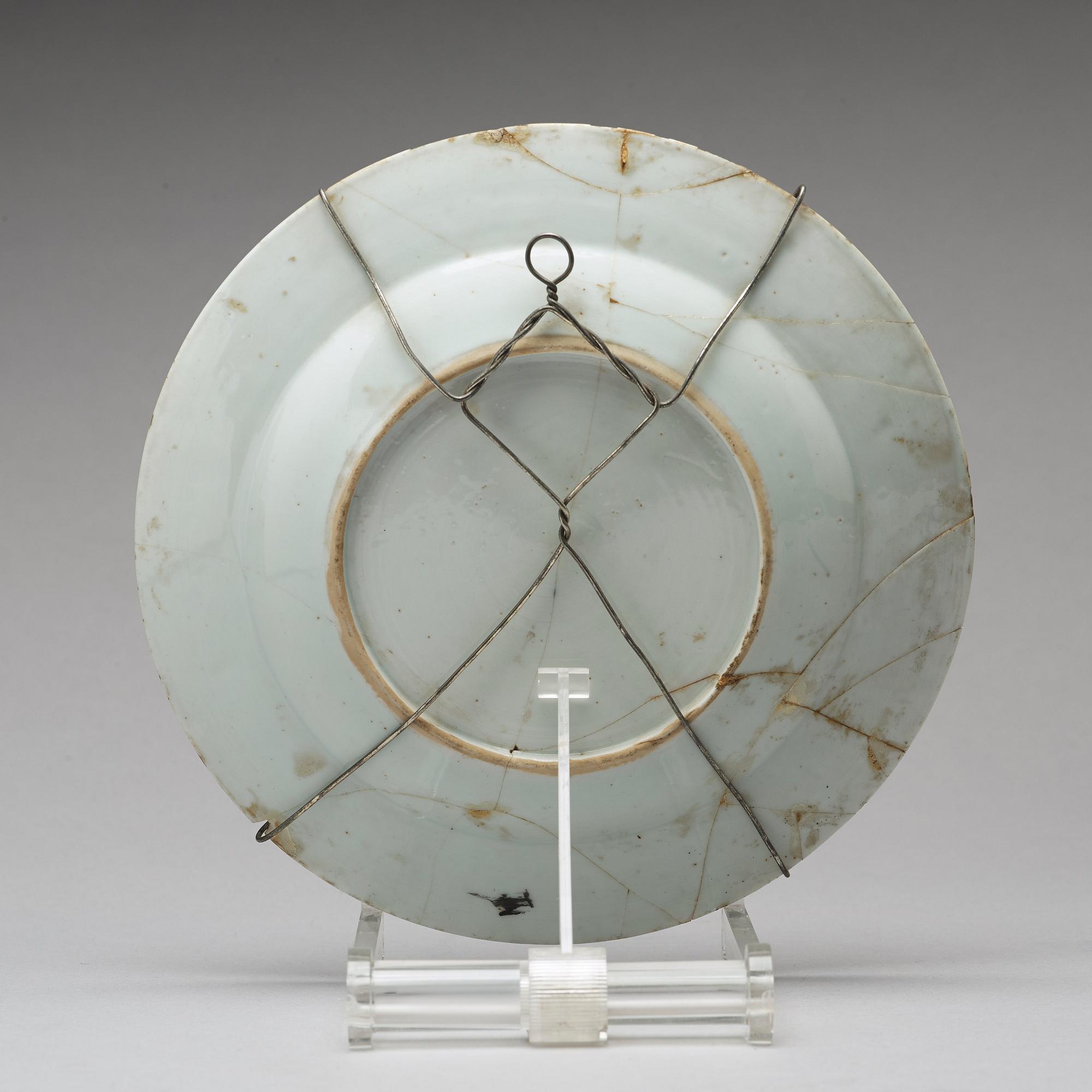 A set of four armorial dinner plates, Qing dynasty, Qianlong (1736-95).