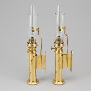 A pair of brass kerosene lamps, GV Harnisch Eftr, Copenhagen, 20th century.