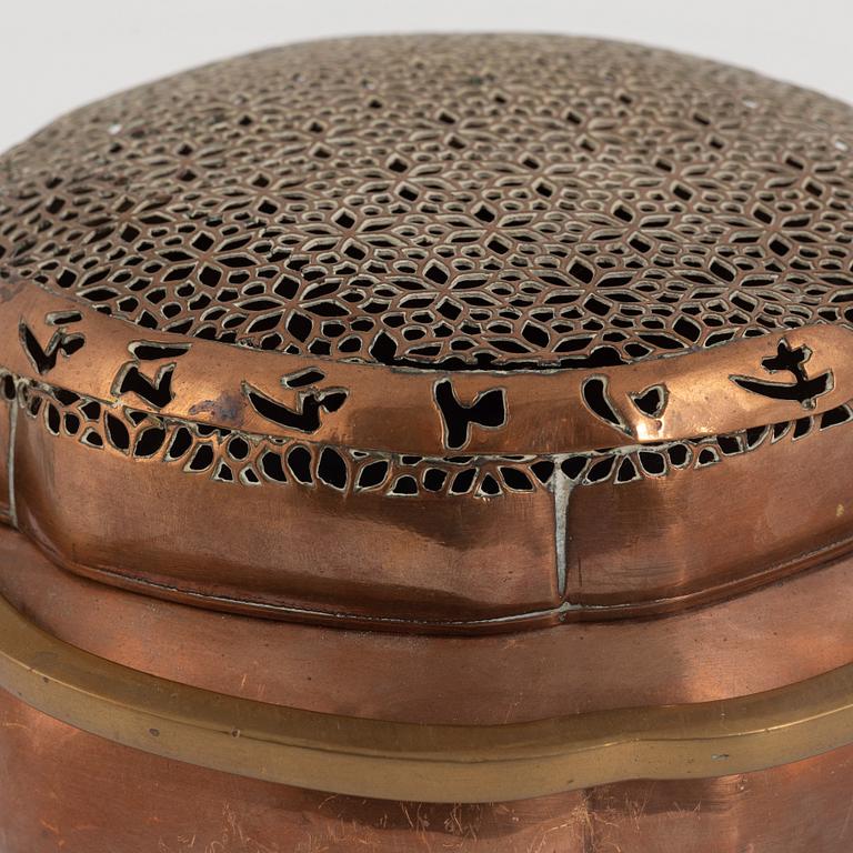 A Chinese copper handwarmer, late Qing dynasty.