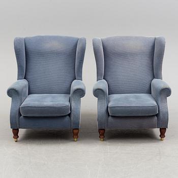 A pair of Parker Knoll 'York' wing chairs.