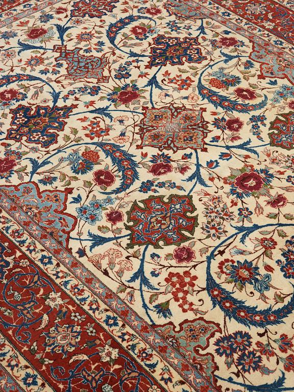 A old Esfahan carpet, around 299 x 210 cm.