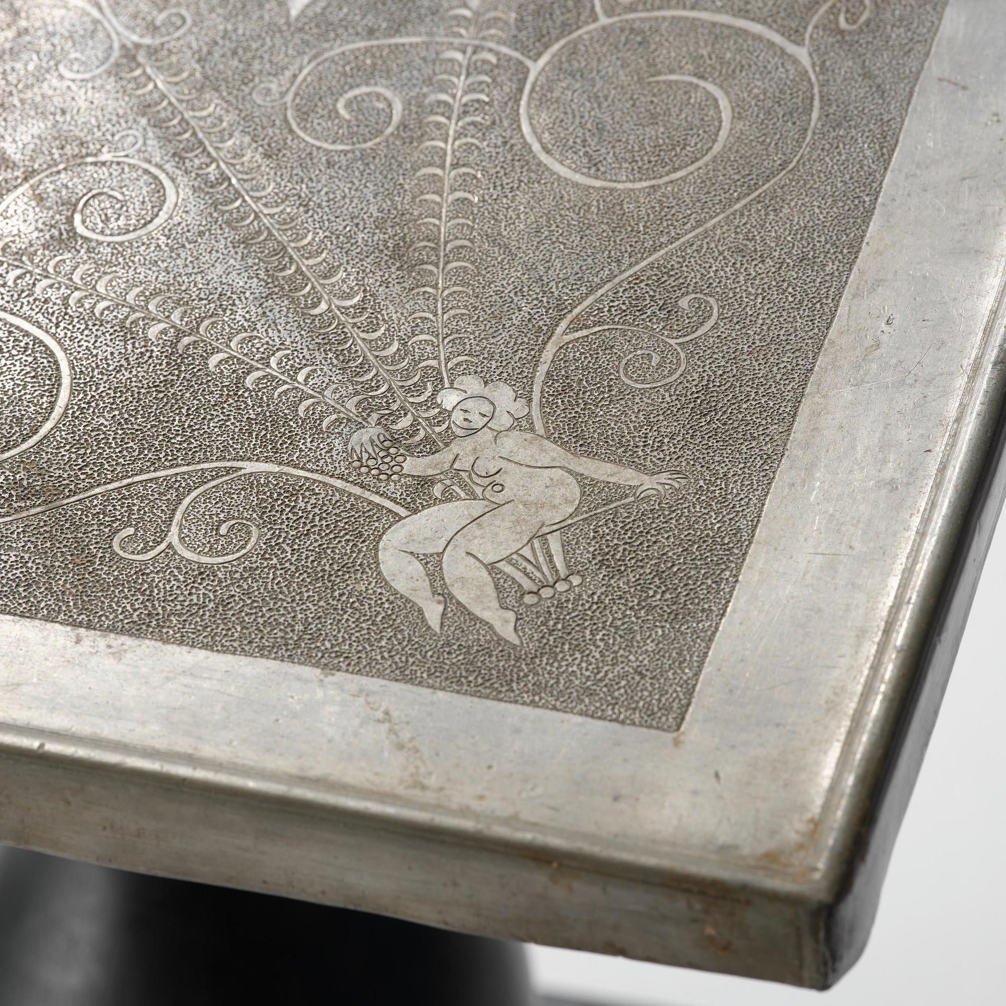 Anna Petrus, a pewter top tray table on a base by Uno Åhrén, executed in her studio, Stockholm, ca 1922-25.