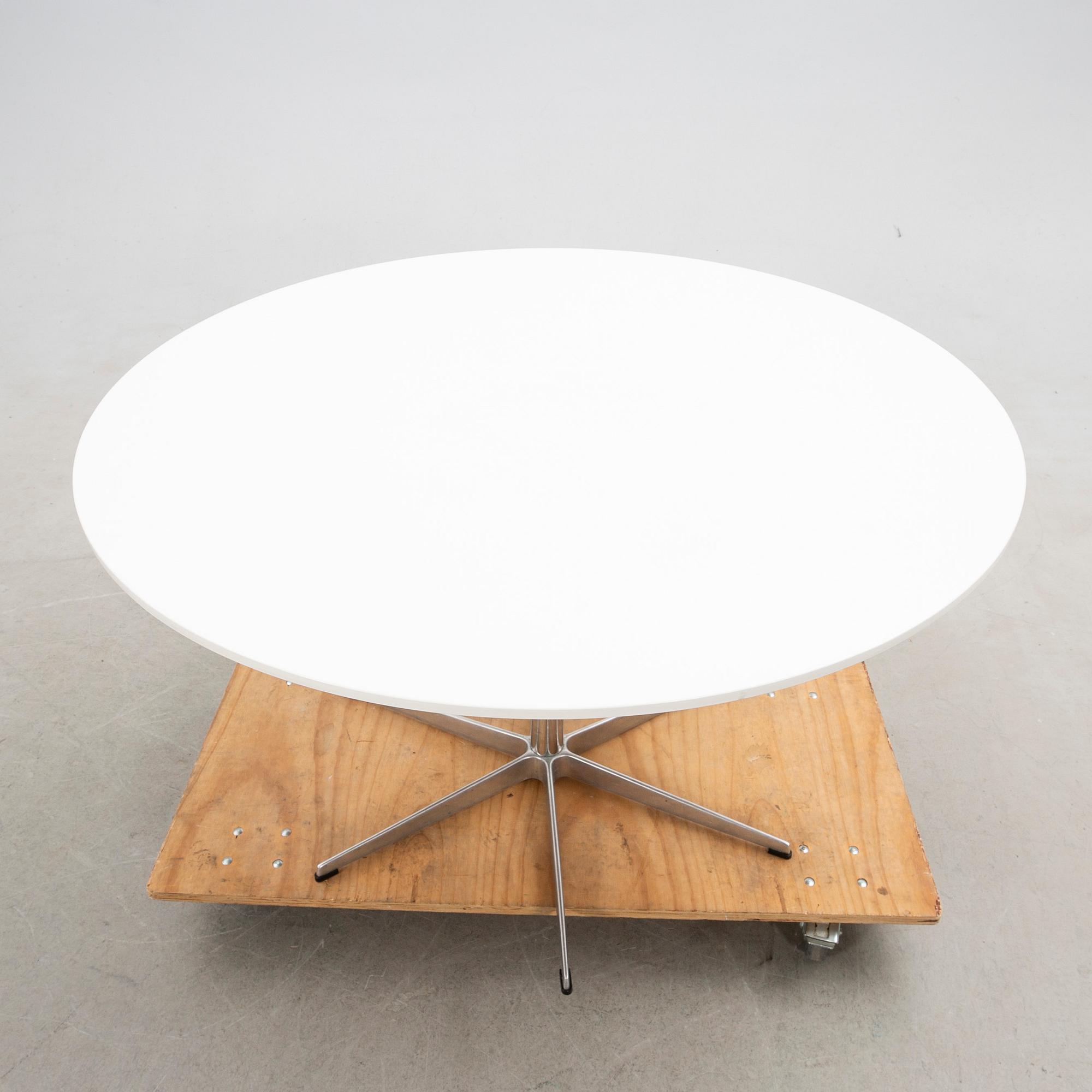 Arne Jacobsen, dining table, "Circular / B825", Fritz Hansen, Denmark, 1985.