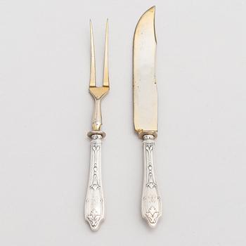 A carving set, silver handles by Grachev brothers, Saint Petersburg, Russia 1908-17.