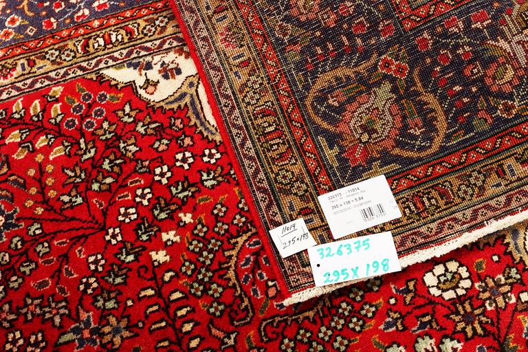 A Tabriz carpet, c 295 x 198 cm.