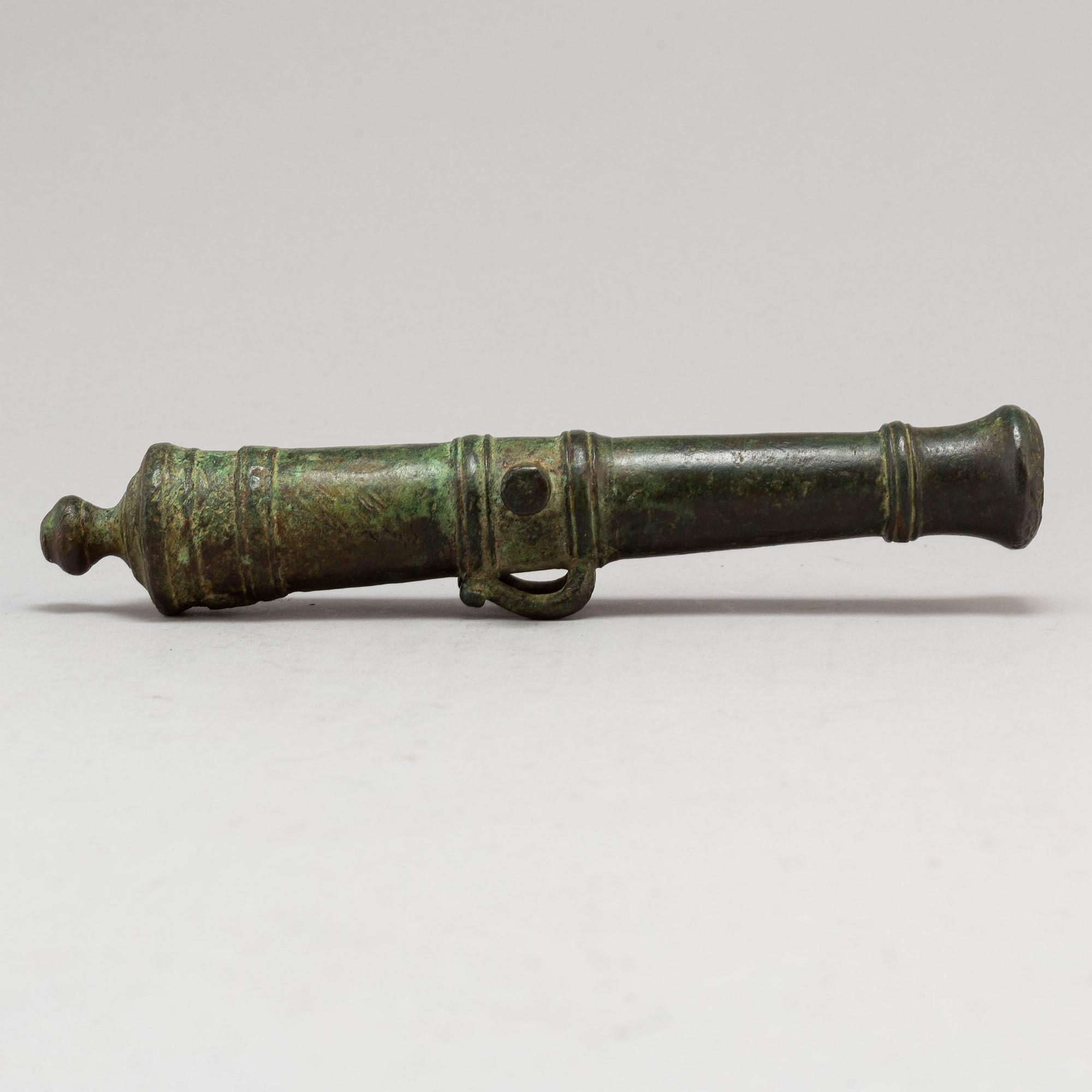 A small bronze cannon probably 19th Century.