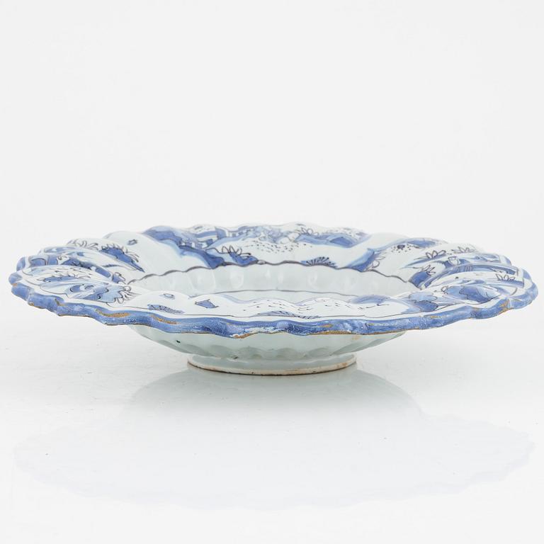 A faiance deep dish, 18th Century.