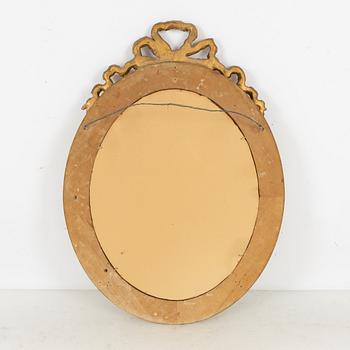 A Gustavian style mirror, 20th century.