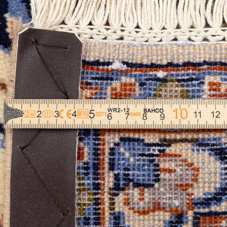 A Najafabad carpet, c. 335 x 255 cm.