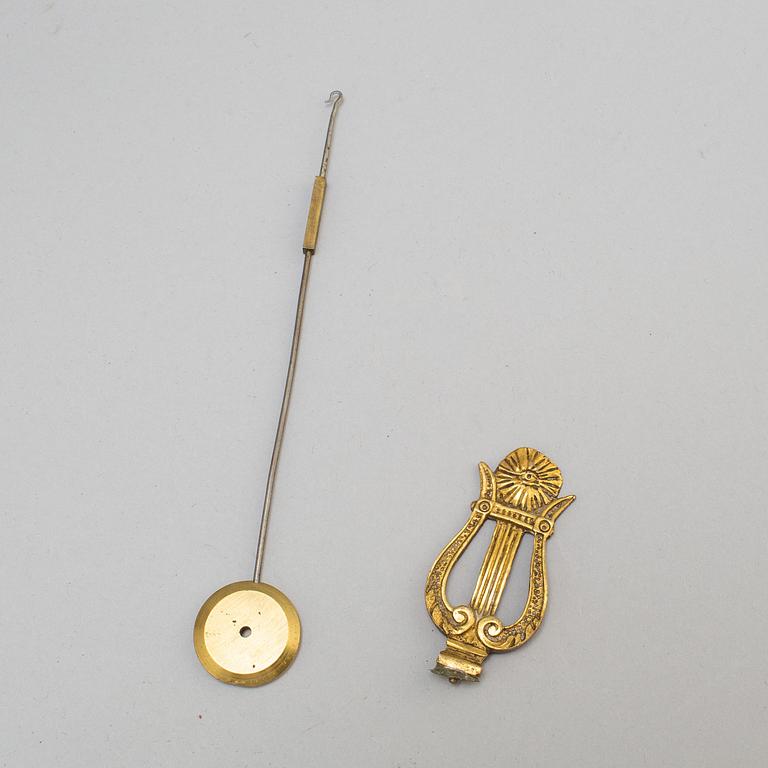 A French late Empire pendulum clock, first half of the 19th century.