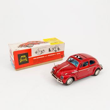 A tinplate Bandai "Volkswagen with openable door", Japan, 1960s.