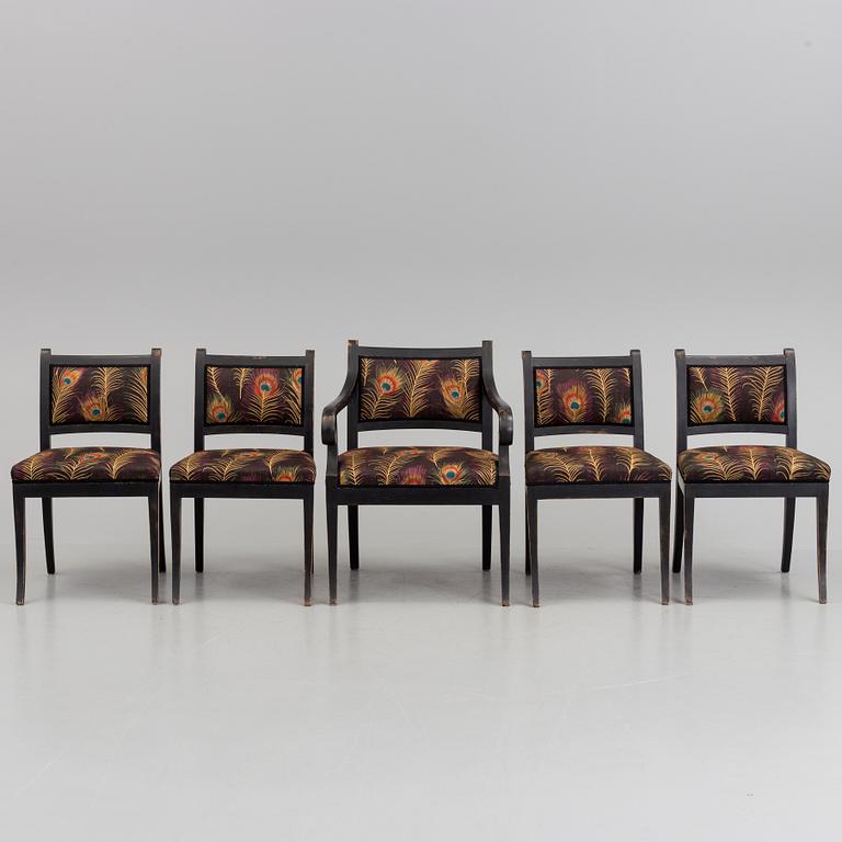 A set of an early 20th century armchair and three easy chairs.