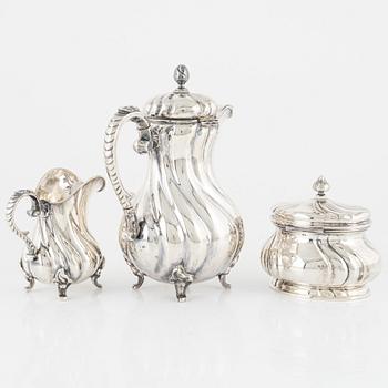 A three-piece silver Rococo-style coffee set, Germany, first half of the 20th century.