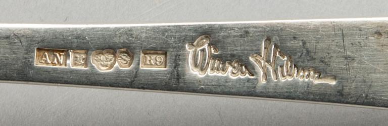 A Swedish 20th century sterling set of three sandwich spoons ad a beaker mark of W Nilsson Lund 1965, 1967 and 1946,