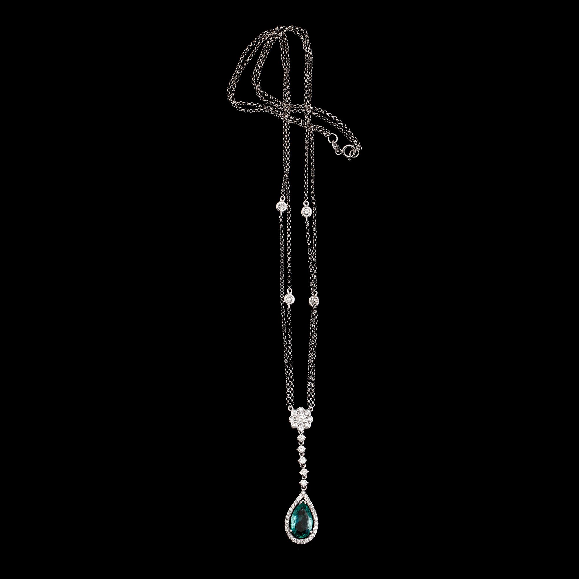COLLIER, 18 k vitguld, smaragd ca 1.86 ct, briljantslipade diamanter tot ca 0.94 ct.