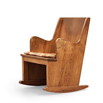 335. Axel Einar Hjorth, a stained pine "Lovö" rocking chair, Nordiska Kompaniet, Sweden 1930's.