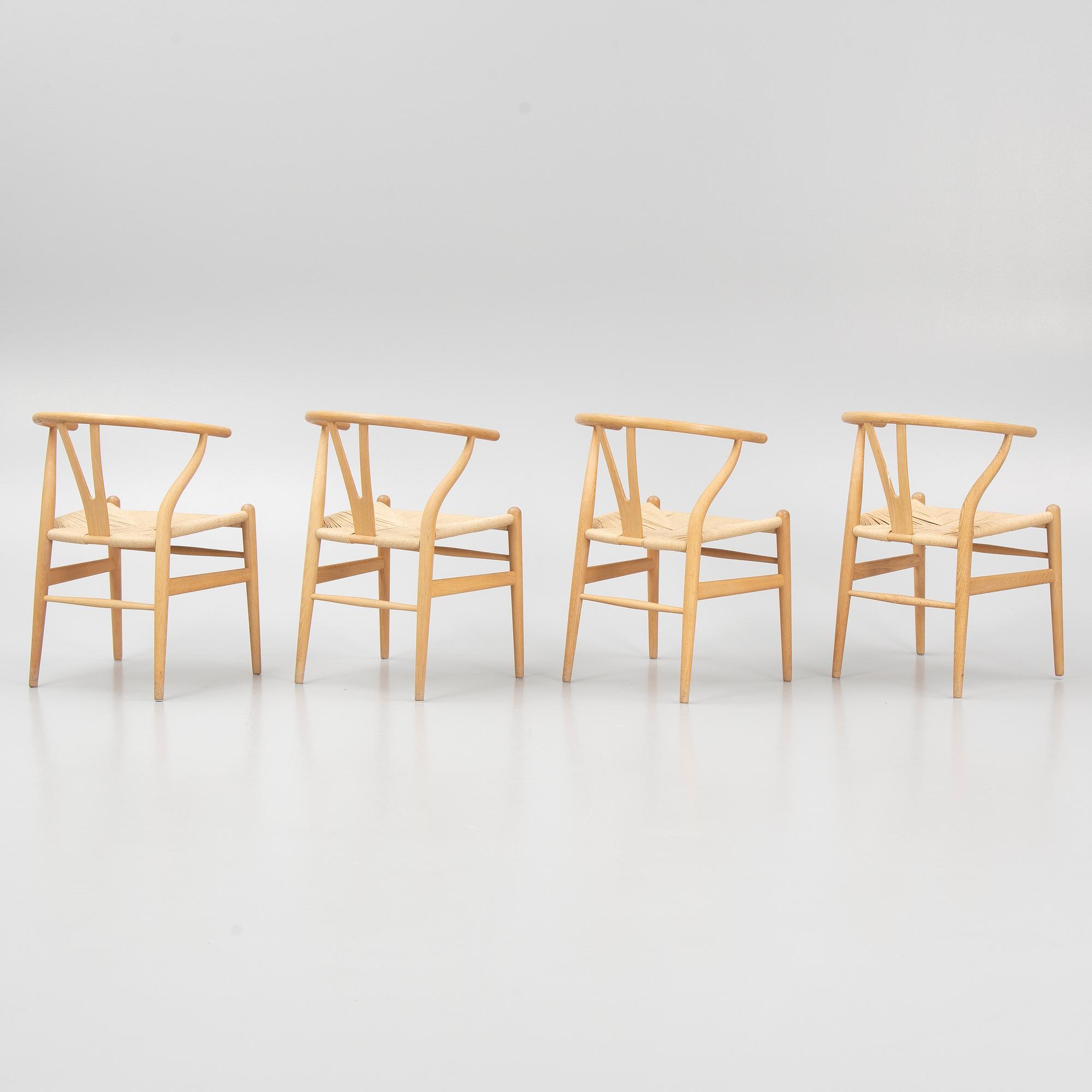 Hans J. Wegner, a set of four model 'CH-24' chairs, Carl Hansen & Søn, Denmark.