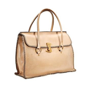 1388. A 21th cent beige leather handbag by Gucci.