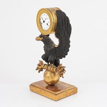 A Swedish Empire giltwood mantel clock by E. Engelbrechten (watchmaker active in Stockholm 1815-45).