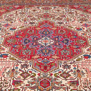 A carpet from Tabriz, around 388 x 294 cm.