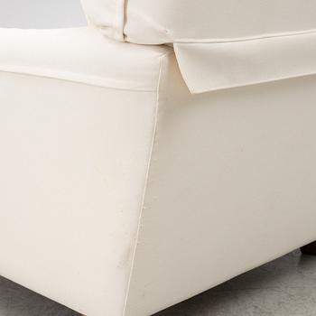 Vico Magistretti, a pair of 'Raffles' armchairs, De Padova, Italy, 21st century.