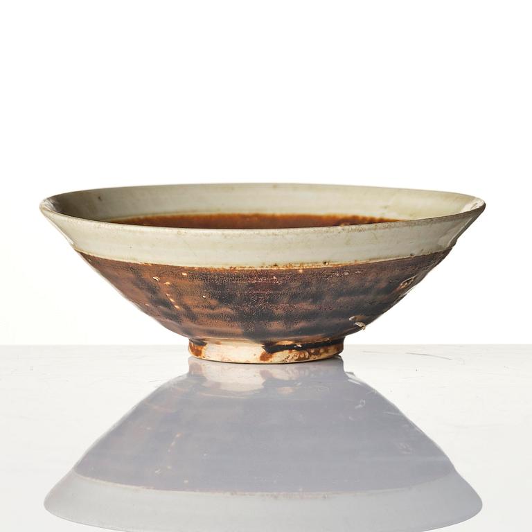 A brown and white glazed bowl, Song dynasty (960-1279).