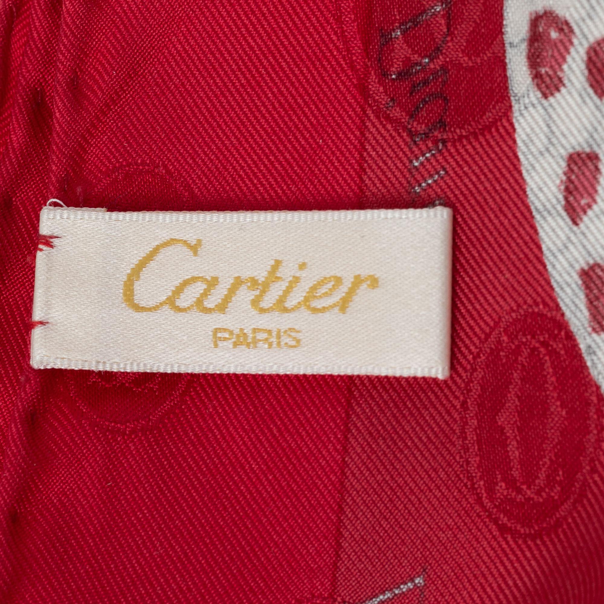 Cartier, a jacquard silk scarf.