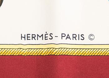 Hermès, a 'Les Voitures à Transformation' silk scarf.
