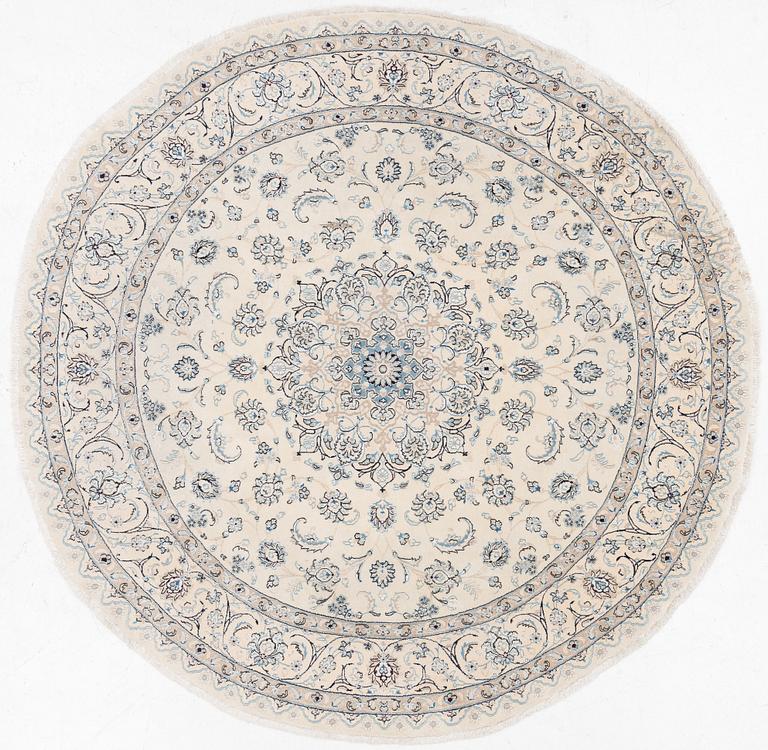 A Nain rug, diameter a. 247 cm.