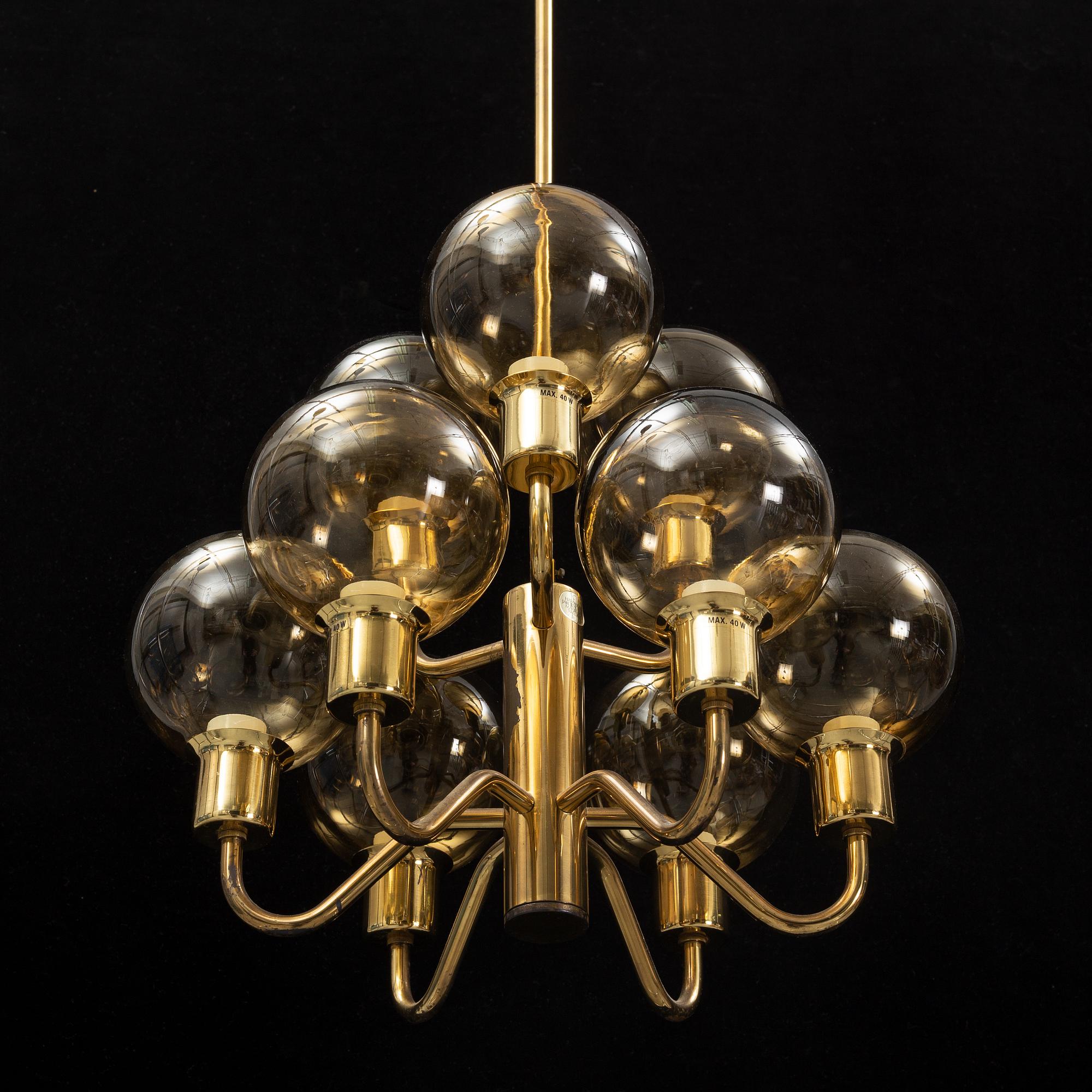 Hans-Agne Jakobsson, a late 20th century brass and glass ceiling lamp for nine lights, Markaryd, Sweden.