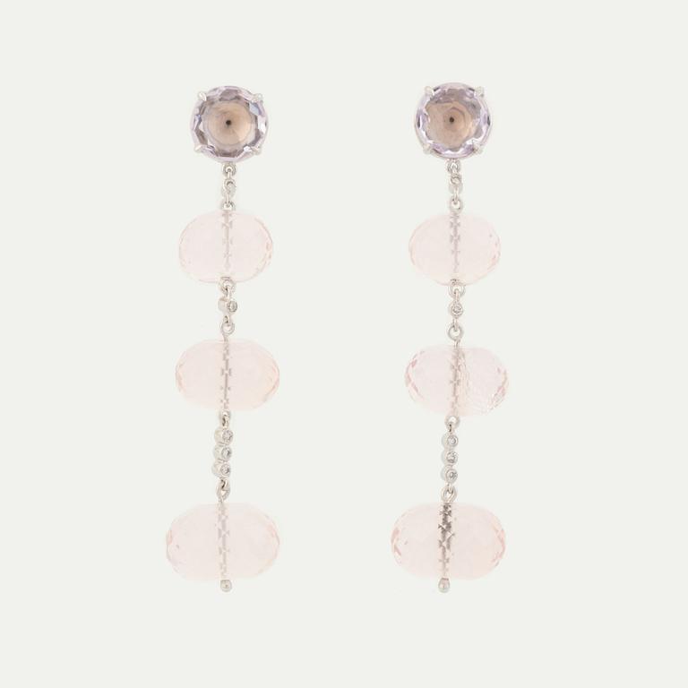 Briolette cut rose quartz and brilliant cut diamond earrings.