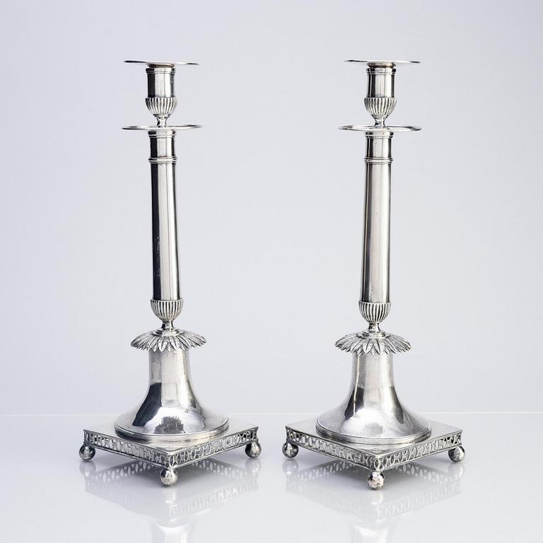 A pair of Swedish early 19th century silver candlesticks, marks of Johan Petter Grönvall, Stockholm 1815.
