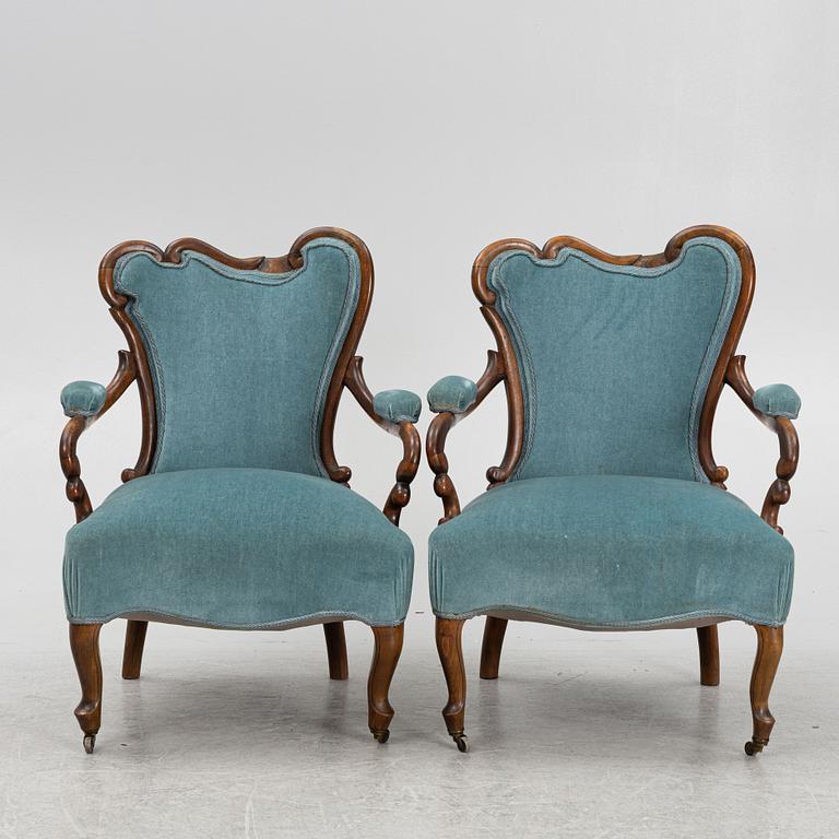 A pair of Rococo-Revival Armchairs, second half of the 19th Century.
