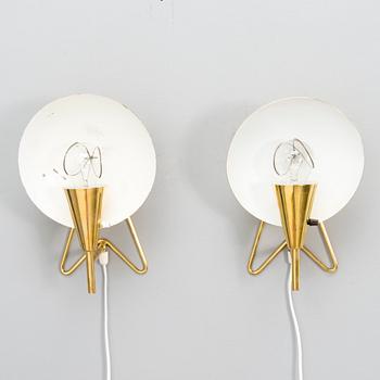 A pair of mid-20th-century wall lights / table lamps, model EV 57 for Itsu, Finland.