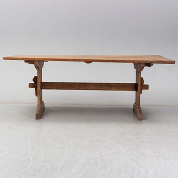 A 19th century pine table.