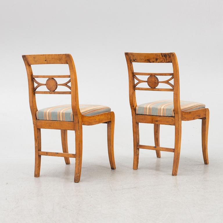 Drop-leaf table and two chairs, Empire style, first half of the 19th century.