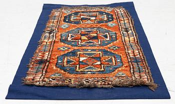 An antique Yastik rug, possibly Afghanistan, c. 110 x 57.