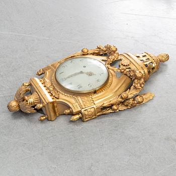 A Gustavian pendulum wall clock.