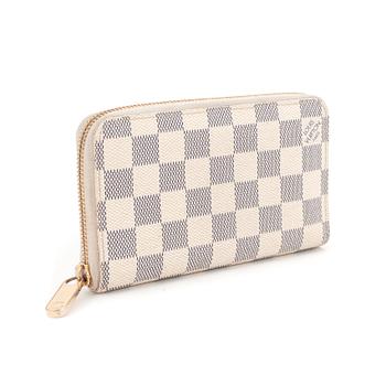 577. LOUIS VUITTON, a damier azur wallet.