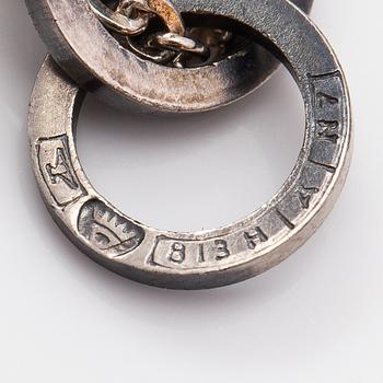 Elis Kauppi, A silver necklace "Woodpecker" with a chalcedony. Kupittaan kulta, Turku 1966.