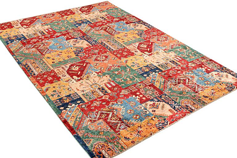 A Kazak carpet, c. 296 x 209 cm.
