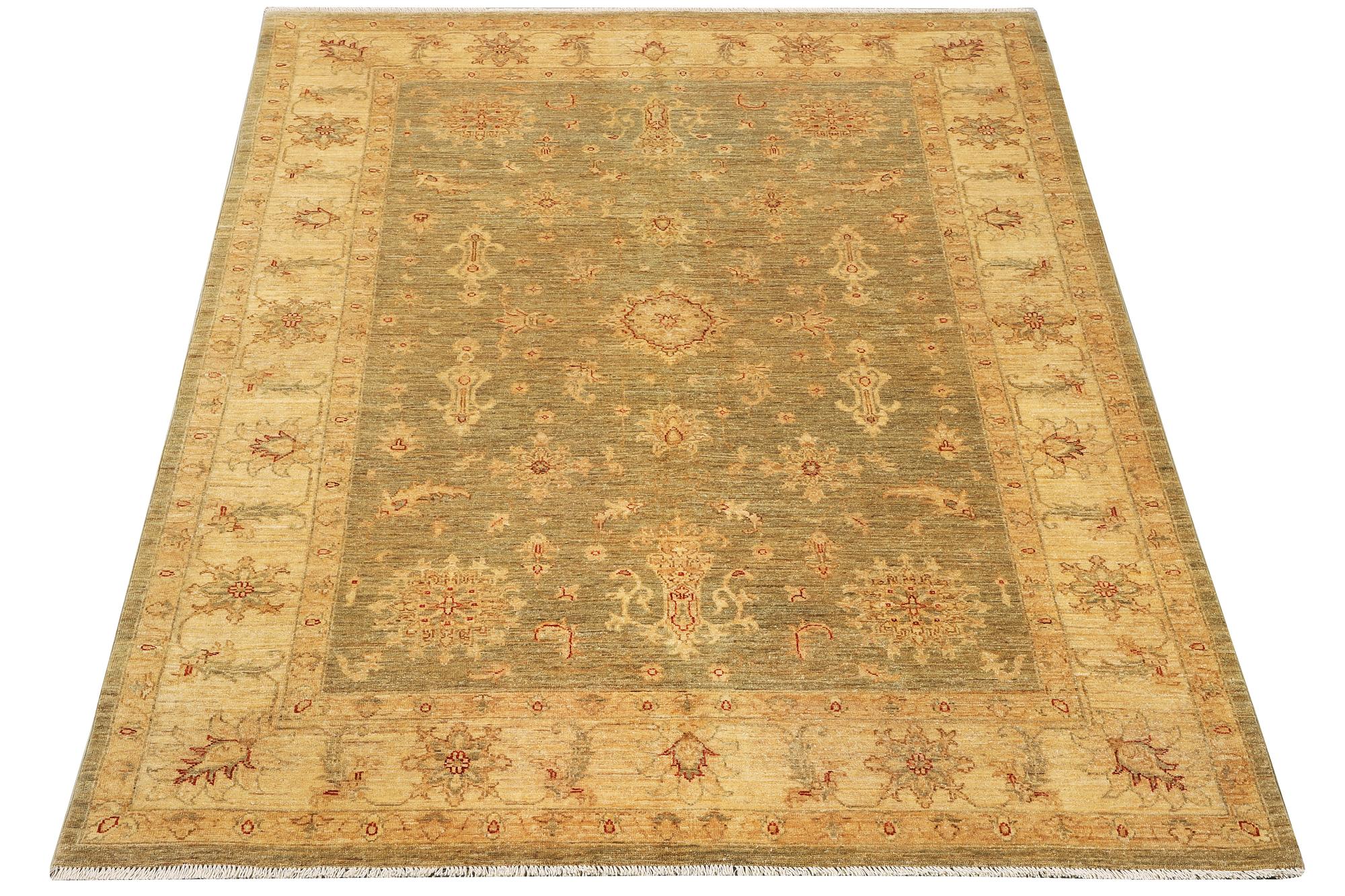 An Ushak rug, c. 244 x 167 cm.