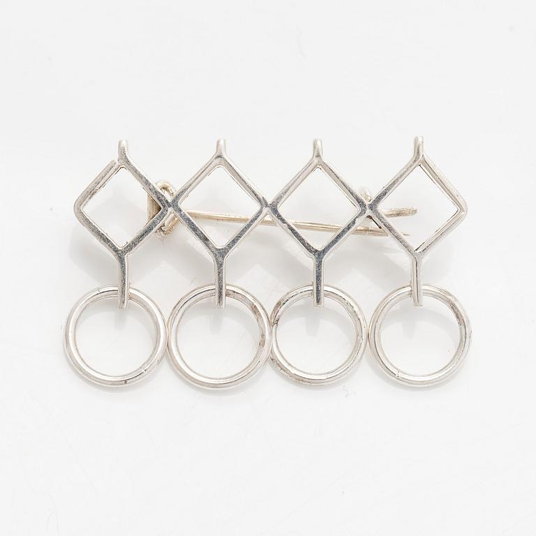 Jorma Laine, a set of two silver pendants, a bracelet and a brooch. Kultateollisuus Oy, Turku 1965-1972.