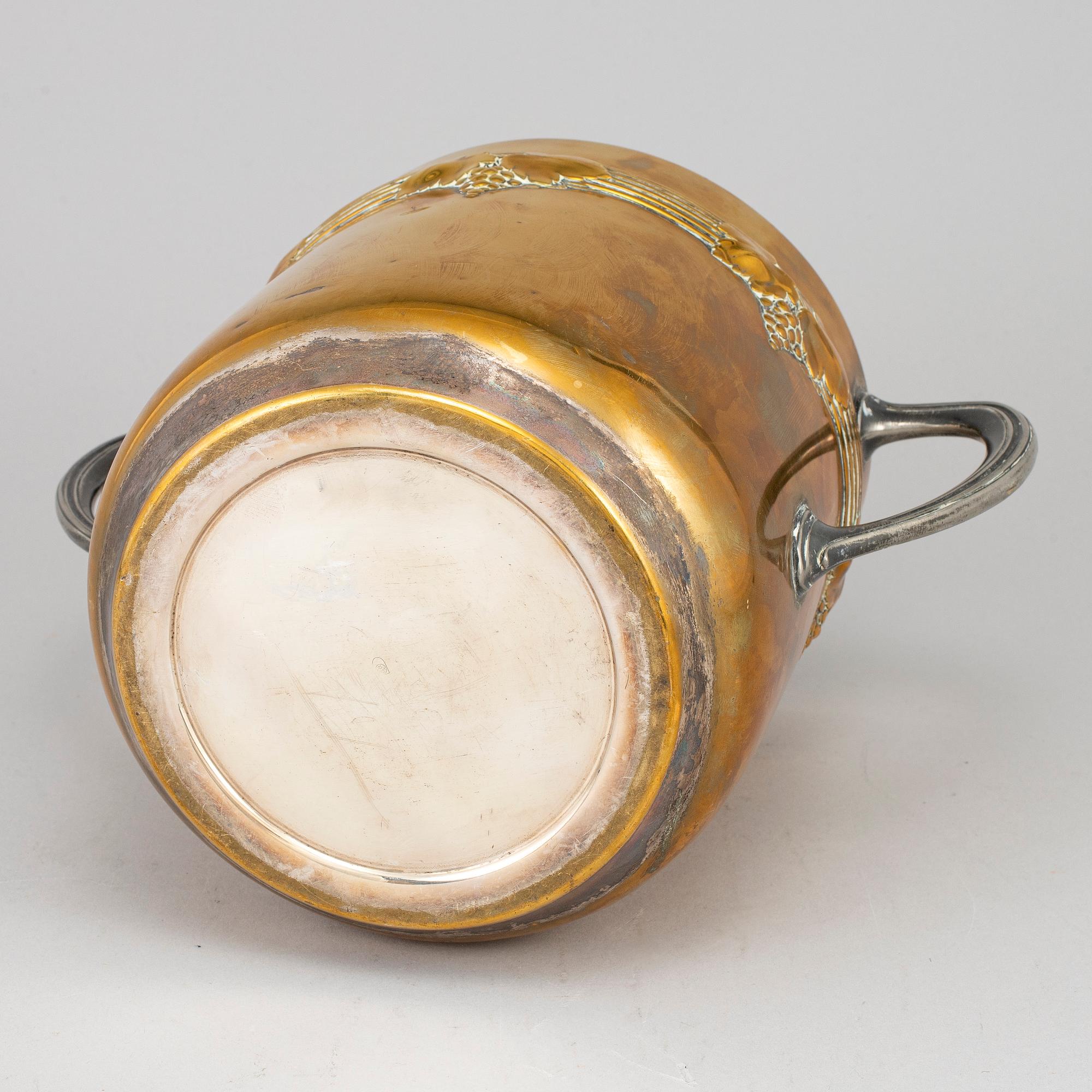 An art nouveau brass champagne cooler, early 20th century.