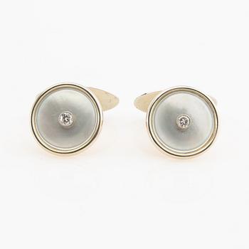 Cufflinks, a pair, 18K gold with mother-of-pearl and round brilliant-cut diamonds.