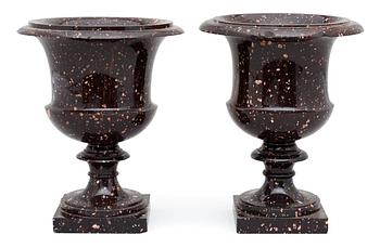 A pair of Swedish Empire 19th century porphyry urns.