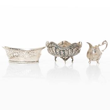 Bowl, basket, and cream jug, silver, 20th century.